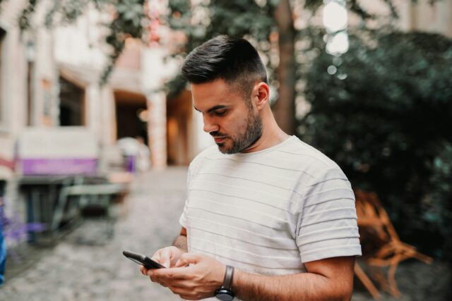 man looking a his phone