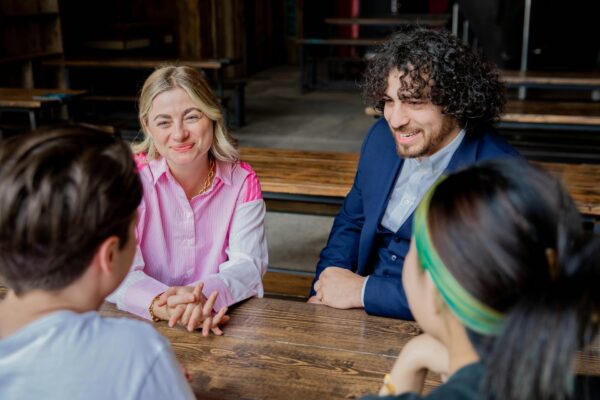 colleagues chatting at a table