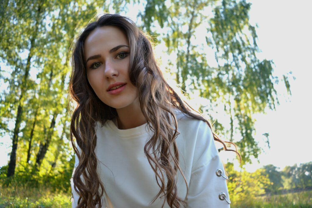 woman in woods with brown hair